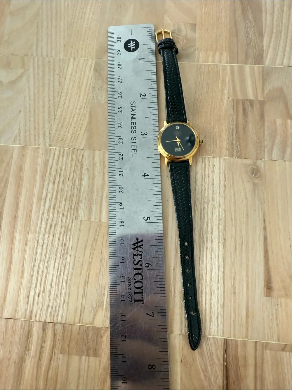 Reliance by croton diamond ladies black and gold tone watch NEW BATTERY